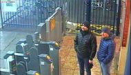 A handout picture taken at Salisbury train station in Salisbury, west of London on March 3, 2018, and released by the British Metropolitan Police Service in London on September 5, 2018, shows Alexander Petrov (R) and Ruslan Boshirov, who are wanted by Bri