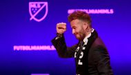 FILE PHOTO: David Beckham, wearing a league scarf, salutes a section of the crowd at this official announcement for Miami's MLS expansion team in Miami, Florida, U.S. January 29, 2018. REUTERS/Andrew Innerarity