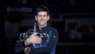 Novak Djokovic of Serbia poses with the U.S. Open trophy after beating Juan Martin del Potro of Argentina in the men's final on day fourteen of the 2018 U.S. Open tennis tournament at USTA Billie Jean King National Tennis Center. Mandatory Credit: Robert 