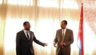 File photo of Eritrea's President, Isaias Afwerki talks to Ethiopia's Prime Minister, Abiy Ahmed during the Inauguration ceremony marking the reopening of the Eritrean Embassy in Addis Ababa, Ethiopia July 16, 2018. REUTERS/Tiksa Negeri/File photo