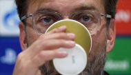 Liverpool's German manager Jurgen Klopp attends a press conference at Anfield Stadium in Liverpool, north west England, on September 17, 2018, on the eve of their UEFA Champions League group C football match against Paris Saint-Germain. / AFP / Paul ELLIS