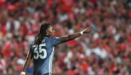 Bayern's Portuguese midfielder Renato Sanches celebrates after scoring the 0-2 goal during the UEFA Champions League group E football match Benfica v FC Bayern Munich in Lisbon on September 19, 2018. AFP / Francisco Leong 