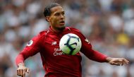 Liverpool's Dutch defender Virgil van Dijk controls the ball during the English Premier League football match between Tottenham Hotspur and Liverpool at Wembley Stadium in London, on September 15, 2018. AFP / Adrian Dennis 