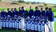 US team captain Jim Furyk (C) looks at his players as they take part in a team photograph ahead of the 42nd Ryder Cup at Le Golf National Course at Saint-Quentin-en-Yvelines, south-west of Paris on September 26, 2018. AFP / Franck Fife

