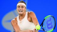 Aryna Sabalenka of Belarus hits a return against Ashleigh Barty of Australia during their women's singles semi-final match at the WTA Wuhan Open tennis tournament in Wuhan on September 28, 2018. AFP / Nicolas Asfouri
