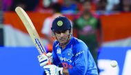 Indian batsman Mahendra Singh Dhoni plays a shot during the final one day international (ODI) Asia Cup cricket match between Bangladesh and India at the Dubai International Cricket Stadium in Dubai on September 28, 2018.  AFP / Ishara S. Kodikara


