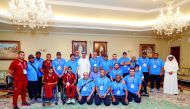 Team Qatar which is taking part in the  Asian Para Games in Jakarta pose for a group picture.