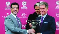 Manateq CEO Fahad Rashid Al Kaabi presenting the trophy to winner of Qatar Prix Jean Luc Lagardere. 
