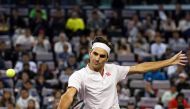 Roger Federer of Switzerland hits a return against Daniil Medvedev of Russia during their men's singles second round match at the Shanghai Masters tennis tournament on October 10, 2018. / AFP / Johannes EISELE