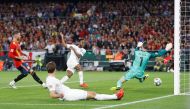 England's Raheem Sterling scores their third goal past Spain's David De Gea. (Action Images via Reuters/Carl Recine)  
