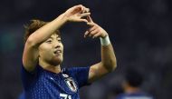 Japan's midfielder Ritsu Doan celebrates scoring during the international football friendly match between Japan and Uruguay in Saitama on October 16, 2018. AFP/Toshifumi Kitamura