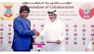 Sheikh Hamad bin Khalifa bin Ahmed Al Thani, President of QFA, and Mohamed Ali Samir Sobha, President of MFA shake hands after the signing ceremony, yesterday.