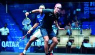 Diego Elias of Peru returns the ball to Mohamed Elshorbagy of Egypt during the quarter-final clash of the Qatar Classic 2018 at the Khalifa International Tennis and Squash Complex in Doha yesterday.