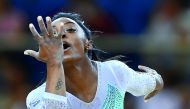 Simone Biles in action during the women’s all-around final yesterday. Picture: Syed Omar