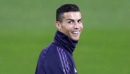 Juventus' Portuguese forward Cristiano Ronaldo smiles during a training session at the Contassina training ground in Turin on November 6, 2018 on the eve of the UEFA Champions League group H football match Juventus vs Manchester. / AFP / Isabella BONOTTO