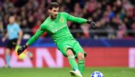 Borussia Dortmund's Swiss goalkeeper Roman Buerki kicks the ball during the UEFA Champions League group A football match between Club Atletico de Madrid and Borussia Dortmund at the Wanda Metropolitan stadium in Madrid on November 6, 2018. / AFP / JAVIER 