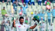 Bangladesh cricket captain Mohammad Mahmudullah reacts after scoring a century during the fourth day of the second Test cricket match between Bangladesh and Zimbabwe at the Sher-e-Bangla National Cricket Stadium in Dhaka on November 14, 2018. AFP / Munir 
