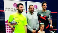 England’s Daryl Selby (left), winner of the QSF No.1, PSA Bronze tournament, poses with the trophy along with runner-up Omar Mosaad of Egypt at the Khalifa International Tennis and Squash Complex in Doha yesterday. 