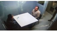 Handout picture released by the Mexican Interior Ministry on January 20, 2017 shows Joaquin Guzman Loera aka El Chapo Guzman sitting in a chair as he is extradited to the US in an unknowen location. AFP
