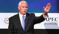 US Vice President Mike Pence gestures at the APEC CEO Summit 2018 in Port Moresby on November 17, 2018, a part of the Asia-Pacific Economic Cooperation (APEC) Summit. / AFP / POOL / Fazry ISMAIL