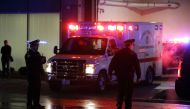 Chicago police officers stand outside the University of Chicago Hospital as the ambulance bearing the body of Chicago police officer Samuel Jimenez is escorted to the morgue November 19, 2018 in Chicago, Illinois. Joshua Lott/Getty Images/AFP
 