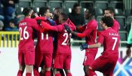 Qatari players celebrate after scoring against Iceland during their friendly match which wa played in Eupen, Belgium on Monday. 