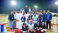 The podium winners, their trainers and Al Shaqab officials pose for a photograph following the presentation ceremony of the EED Internal Competition at the Al Shaqab Arena on Thursday.