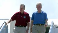 (FILES) In this file photo taken on February 18, 2005 US former presidents George Bush Senior (L) and Bill Clinton arrives in Phuket, south Thailand. AFP / Roslan RAHMAN