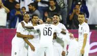 Al Sadd's players celebrate their win over Al Duhail, yesterday. 