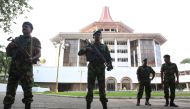 Sri Lanka's Special Task Force members stand guard in front of the supreme court premises in Colombo, Sri Lanka December 13, 2018. Reuters