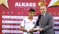 A player of Étoile Sportive du Sahel receiving the Man-of-the-match award after their match against Bayern Munich during the Al Kass Cup at Aspire Academy yesterday.