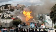 Fire fighters battle a fire sparked by a ruptured gas line in San Francisco, California, U.S., February 6, 2019. Reuters/Stephen Lam