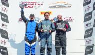 Abdulla Al Khelaifi (centre), Mohamad Al Khaiat (left) and Ahmed Al Asiri pose on the podium after yesterday’s first race.