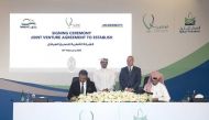 Nakilat and McDermott officials signing the joint venture partnership agreement in the presence of H E Saad bin Sherida Al Kaabi, Minister of State for Energy Affairs, President & CEO of Qatar Petroleum; and Linh Austin, McDermott Senior Vice-President, M