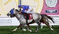 Jockey Harry Bentley guides Ishfaq to win the Al Zubara Trophy on the opening day of the Amir’s Sword Festival at Qatar Racing and Equestrian Club, yesterday.