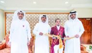 Faleh Suwead Al Ajami is seen with QEF President Hamad Abdulrahman Al Attiyah after winning the Amir’s Golden Sword on the final day of the three-day Show Jumping Festival at the Outdoor Arena of the Qatar Equestrian Federation (QEF). 