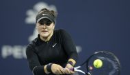 Bianca Andreescu of Canada returns a shot to Angelique Kerber of Germany during Day 6 of the Miami Open Presented by Itau at Hard Rock Stadium on March 23, 2019 in Miami Gardens, Florida. Michael Reaves/AFP
