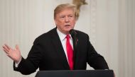 US President Donald Trump speaks prior to awarding a posthumous Medal of Honor for US Army Staff Sergeant Travis Atkins during a ceremony in the East Room of the White House in Washington, DC, March 27, 2019.  AFP / SAUL LOEB