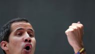 Venezuelan opposition leader Juan Guaido, who many nations have recognised as the country's rightful interim ruler, gestures as he speaks during a meeting with political leaders in Caracas, March 27, 2019. Reuters/Ivan Alvarado  