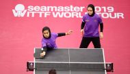 Qatar’s Maha Faramarzi and Aia Mohamed in action against Chinese Taipei’s Chen Szu-Yu and Cheng Hsien-Tzu during their women’s doubles Round of 16 match of the ITTF World Tour Platinum Qatar Open at the Ali Bin Hamad Al Attiyah Arena, yesterday. Picture: 
