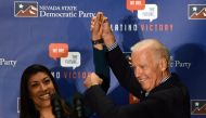 In this file photo taken on November 1, 2014 former Democratic candidate for lieutenant governor and current Nevada Assemblywoman Lucy Flores (D-Las Vegas) (L) introduces former US Vice President Joe Biden at a get-out-the-vote rally at a union hall in La