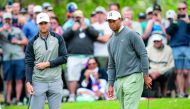  Lucas Bjerregaard and Tiger Woods on the 16th green during the quarterfinal round of the WGC - Dell Technologies Match Play golf tournament at Austin Country Club. Mandatory Credit: Stephen Spillman-USA TODAY Sports

