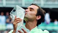 Roger Federer of Switzerland poses with the winners trophy after defeating John Isner in straight sets during the Men's Final match on day 14 of the Miami Open presented by Itau at Hard Rock Stadium on March 31, 2019 in Miami Gardens, Florida. Al Bello/Ge