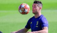 Juventus' Portuguese forward Cristiano Ronaldo juggles with a ball during a training session on April 15, 2019 at the Continassa training center in Torino, on the eve of the UEFA Champions League quarter-final second leg football match Juventus vs Ajax Am