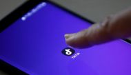 FILE PHOTO: The logo of the TikTok application is seen on a mobile phone screen in this picture illustration taken February 21, 2019. REUTERS/Danish Siddiqui/File Photo