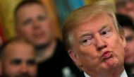 Donald Trump reacts as he speaks at the Wounded Warrior Project Soldier Ride event after the release of Special Counsel Robert Mueller's report, in the East Room of the White House, April 18, 2019. Reuters/Carlos Barria