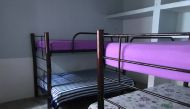 Empty bunk beds sit in a shelter for victims of human trafficking in Tapachula, Mexico, March 26, 2019. Thomson Reuters Foundation / Christine Murray 