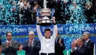 Austria's Dominic Thiem celebrates with the trophy after winning the Barcelona Open REUTERS/Albert Gea