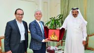 Qatar Chamber First Vice-Chairman Mohamed bin Ahmed bin Towar Al Kuwari (right) with Chairman of Ankara Metal Products Exporters Association, Serafettin Ceceli (centre), at the QC headquarters yesterday.