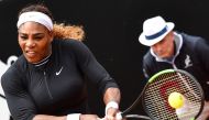 US Serena Williams hits a return to Sweden's Rebecca Peterson, during their WTA Masters tournament tennis match on May 13, 2019 at the Foro Italico in Rome. (AFP / Andreas SOLARO)